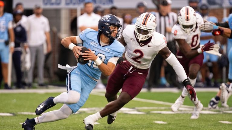 Old Dominion quarterback Quinn Henicle (10) runs out of the...