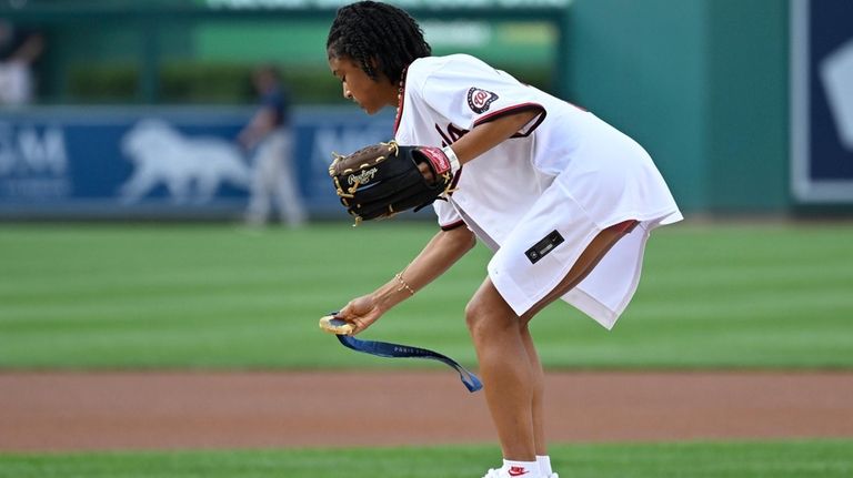 U.S. Olympic women's soccer team member Croix Bethune lays down...