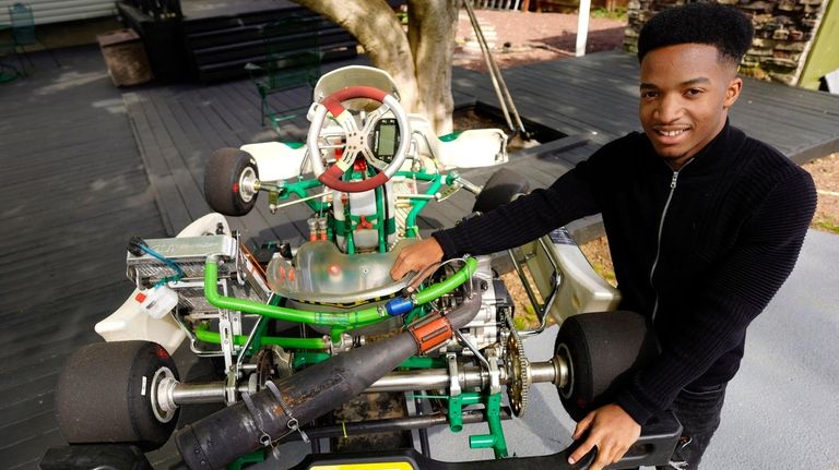 Nicholas Rivers, of Wheatley Heights, with a Go-Kart he used for...