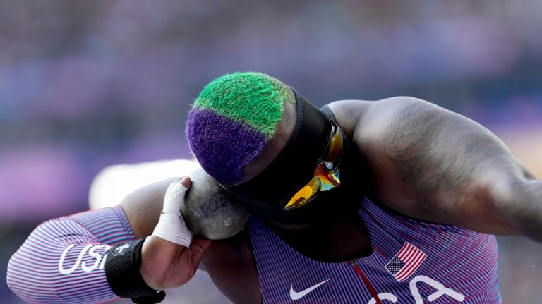 Raven Saunders, of the United States, competes during the women's...