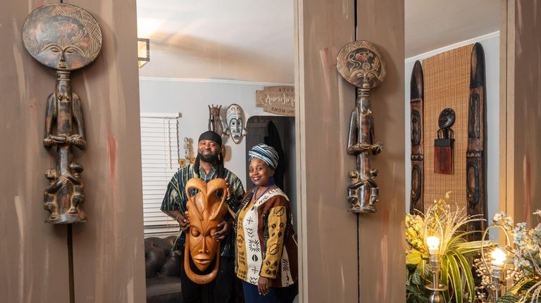 Xeny Odame and her husband Kumi Odame display Afrocentric decor...