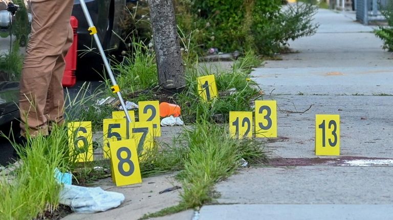 NYPD crime scene investigators probe scene of fatal shooting in Canarsie,...