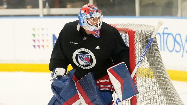 Rangers goaltender Louis Domingue looks during training camp in Greenburgh, N.Y....