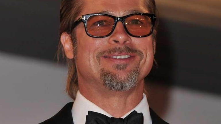 Actor Brad Pitt leaves "The Tree Of Life" premiere during...