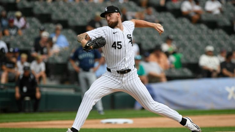 Chicago White Sox starter Garrett Crochet delivers a pitch during...