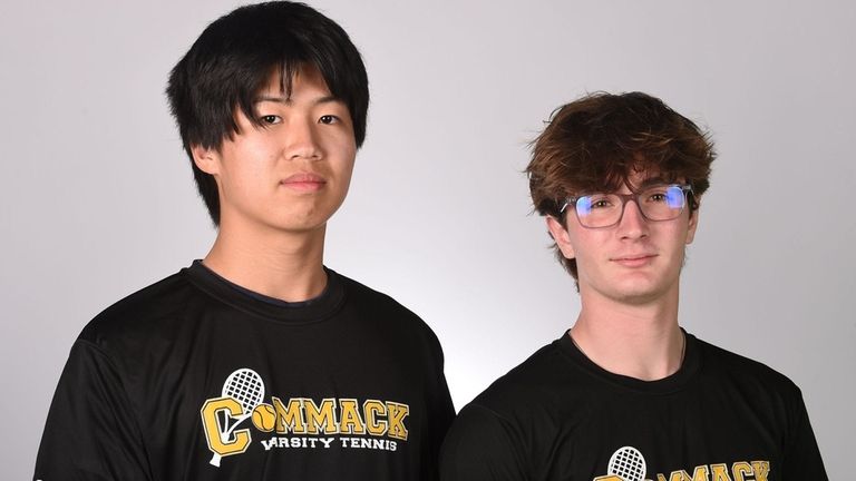 Teammates James Yu, left, and Joe Romito of Commack High...