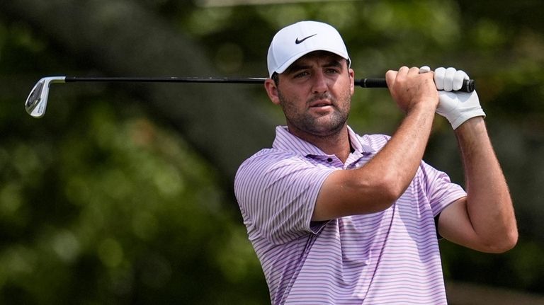 Scottie Scheffler hits from the third tee during the first...