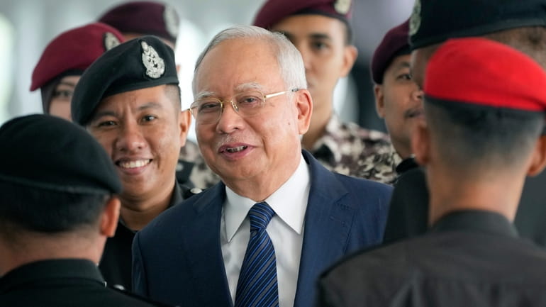 Former Malaysian Prime Minister Najib Razak arrives at the Kuala...