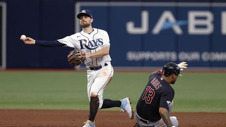 Tampa Bay Rays' Randy Arozarena, right, celebrates with Isaac Paredes after  hitting a three-run home run during the first inning of a baseball game  against the New York Yankees, Tuesday, Aug. 16