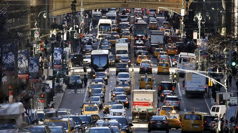 Traffic fills 42nd Street in midtown Manhattan on Jan. 25.