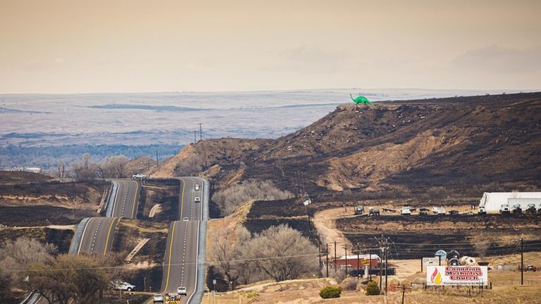 Aud the Dinosaur still stands after the Smokehouse Creek fire,...