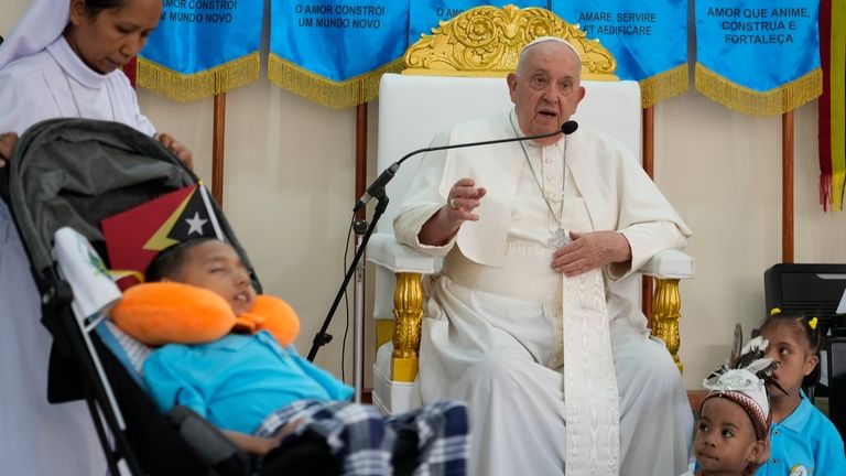 Pope Francis speaks during a visit at the 'Irmas ALMA'...