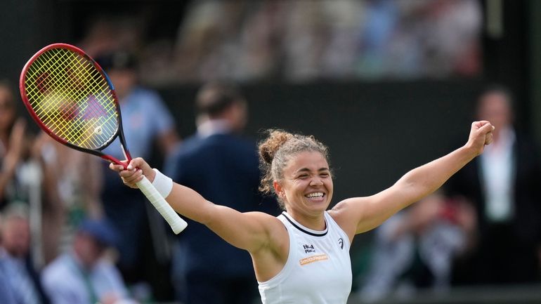 Jasmine Paolini of Italy celebrates after defeating Donna Vekic of...