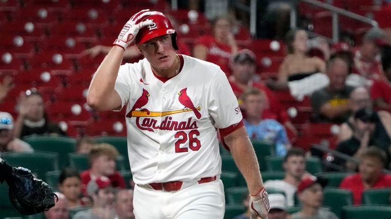 St. Louis Cardinals' Luken Baker reacts after striking out to...