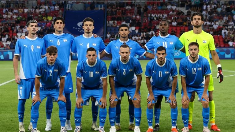 Israel pose for a team photo ahead of the men's...