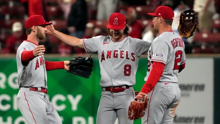 Los Angeles Angels' Hunter Renfroe, right, celebrates hitting a