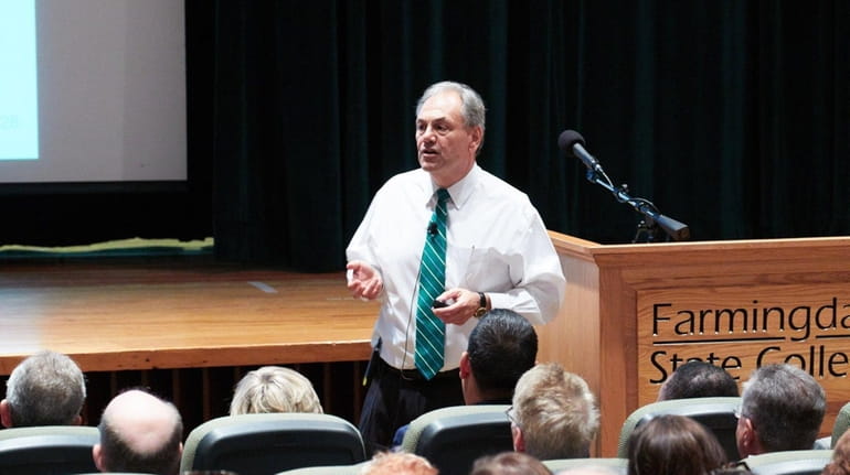 John S. Nader, President of Farmingdale State College, speaks at...