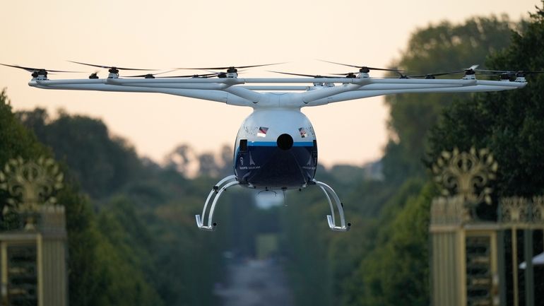 A Volocopter aircraft carries out a test flight on the...