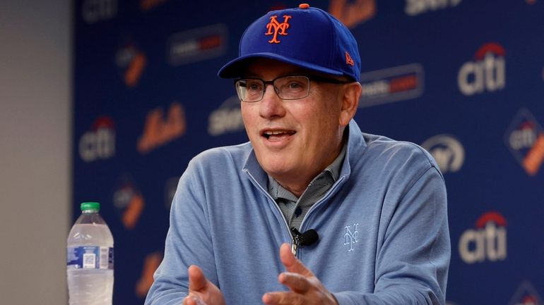 Mets owner Steve Cohen addresses the media before a game...