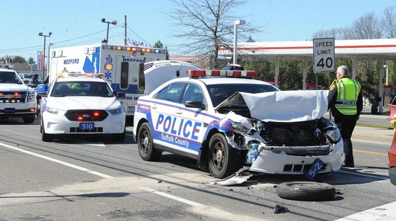 Officials said a Suffolk police officer and another driver were...