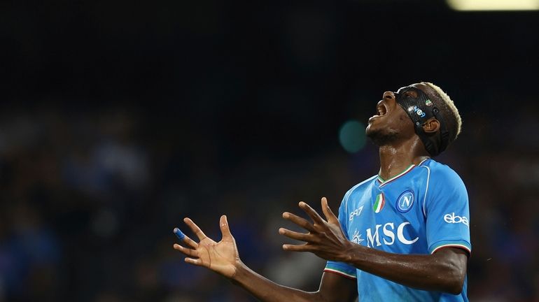 Napoli's Victor Osimhen reacts during the Serie A soccer match...