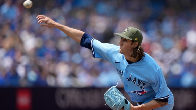 Toronto Blue Jays starting pitcher Kevin Gausman pitches to the...