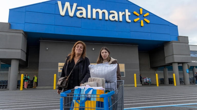 Katie Andres and her daughter Jenna Ames hit Walmart in...