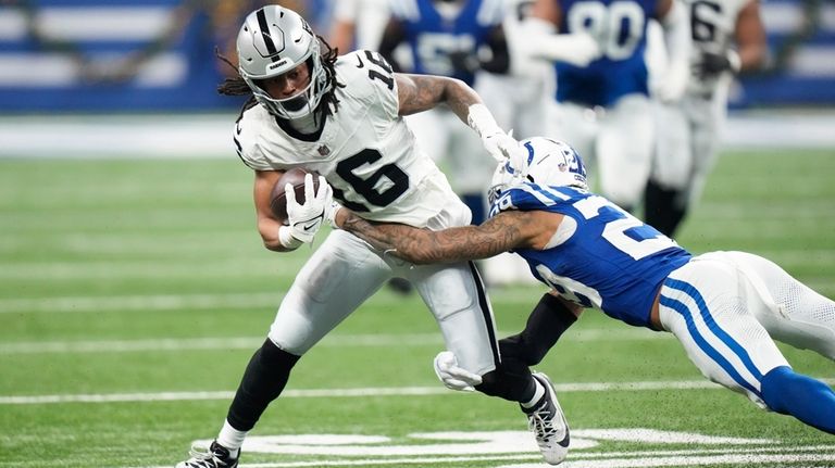 Las Vegas Raiders wide receiver Jakobi Meyers (16) is tackled...