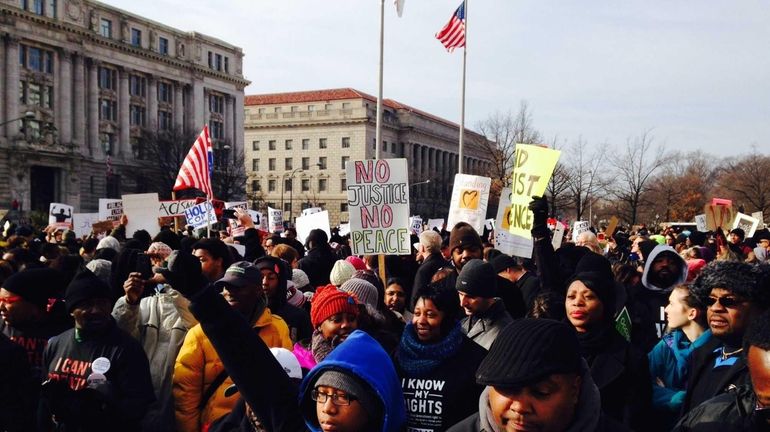 Thousands of people, including Garner's family, marched in Washington, D.C....