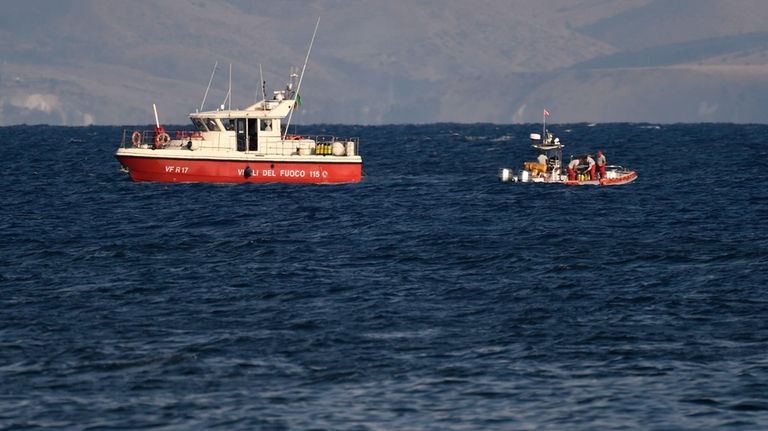 Emergency services at the scene of the search for a...