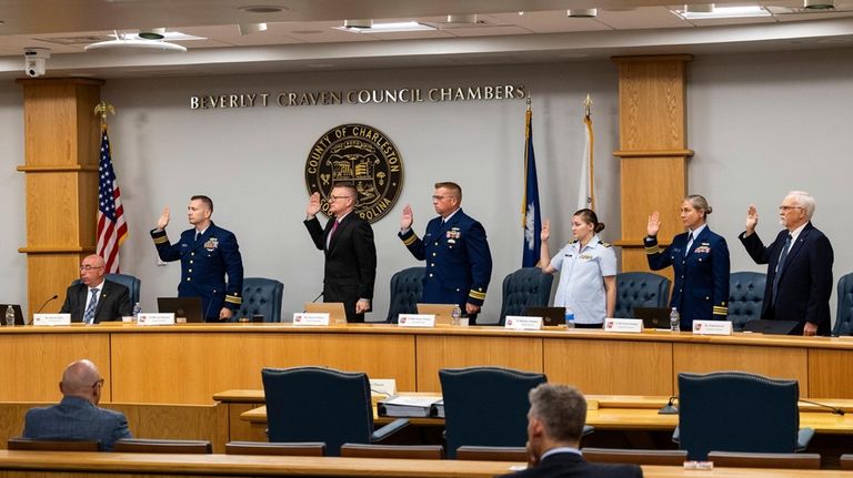 Coast Guard members of the investigative board for the Titan...