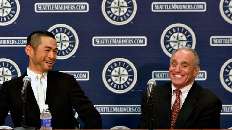 Seattle Mariners' Ichiro Suzuki, left, and agent Tony Attanasio, Friday,...