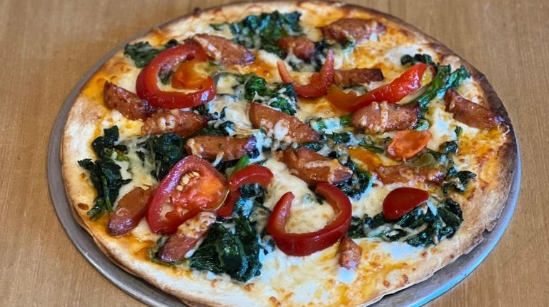 A chorizo and broccoli rabe "pizzadilla" from Tony's Tacos in...