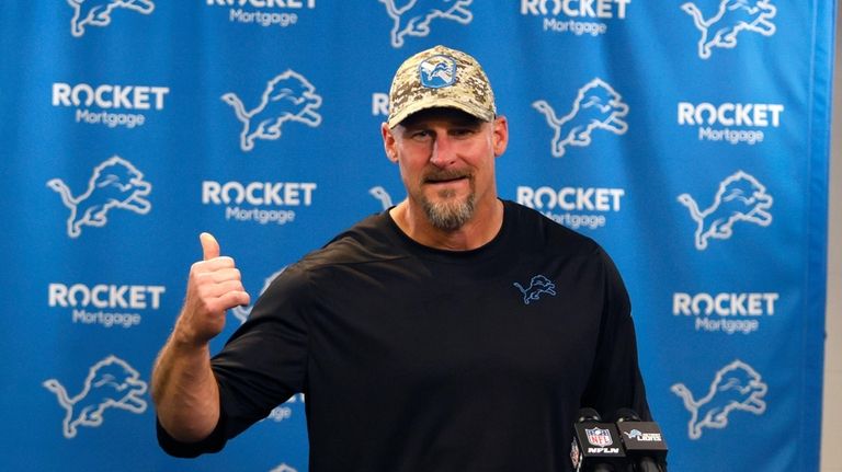 Detroit Lions head coach Dan Campbell addresses the media after...