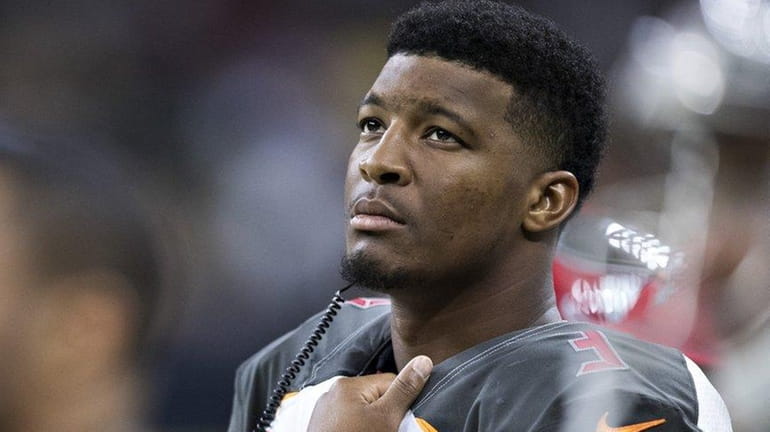 Jameis Winston #3 of the Tampa Bay Buccaneers watches a...