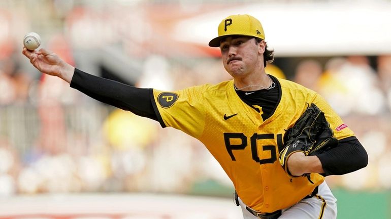 Pittsburgh Pirates starting pitcher Paul Skenes delivers during the second...