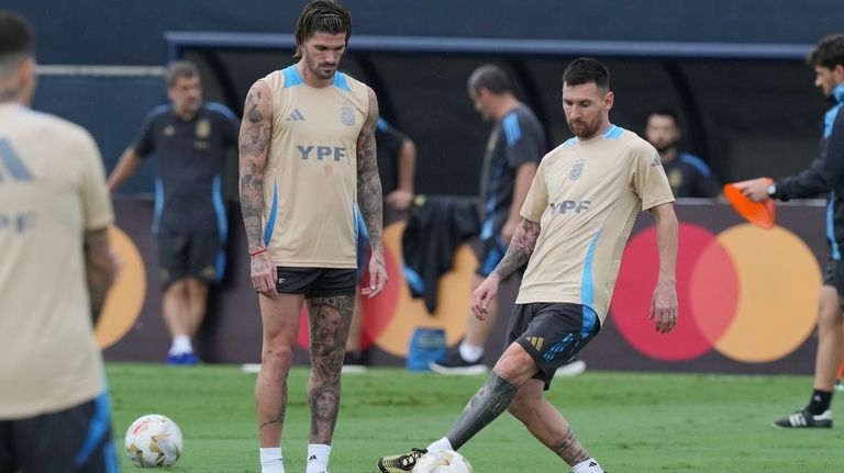 Lionel Messi, front right, practices with the Argentina team, Thursday,...