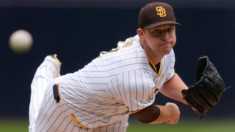 San Diego Padres starting pitcher Michael King works against a...