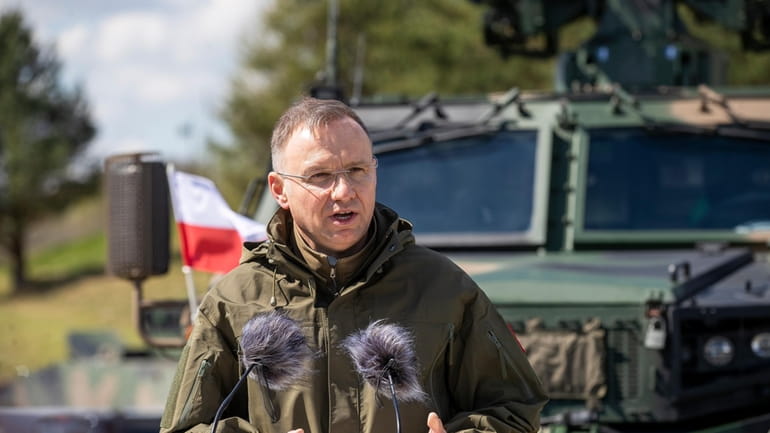 Polish and Lithuanian leaders oversee military drills along their ...