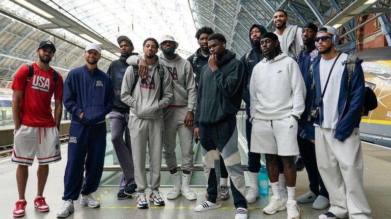 The United States Men's National Basketball Team pose for photographs...