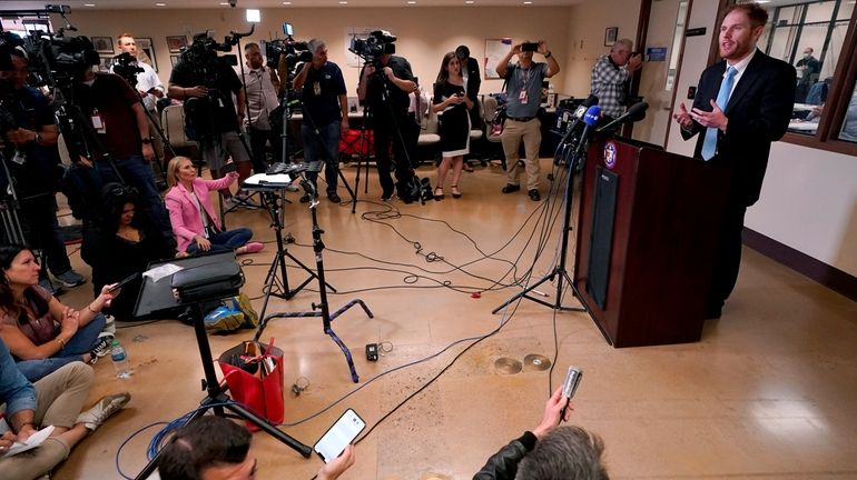 Maricopa County Recorder Stephen Richer speaks inside the Recorders Office,...