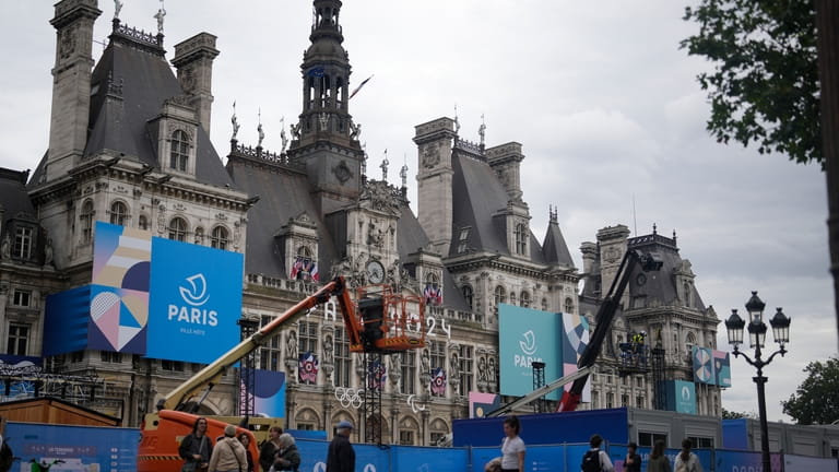 Construction barriers surround Hotel de Ville square, Wednesday, July 3,...