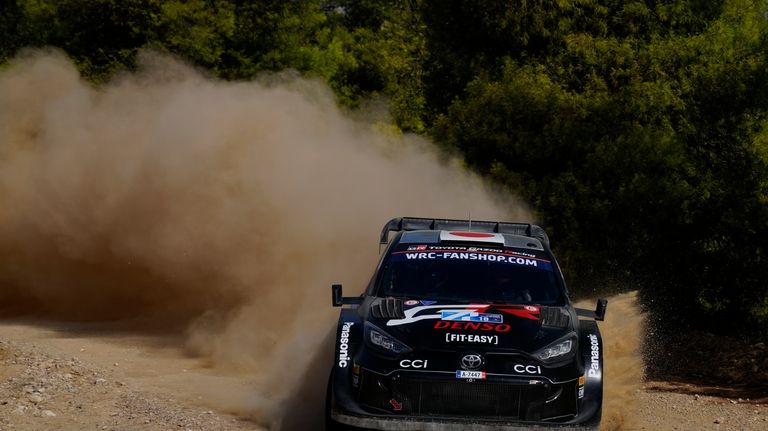 Japan's Takamoto Katsuta and his Irish co-driver Aaron Johnston with...