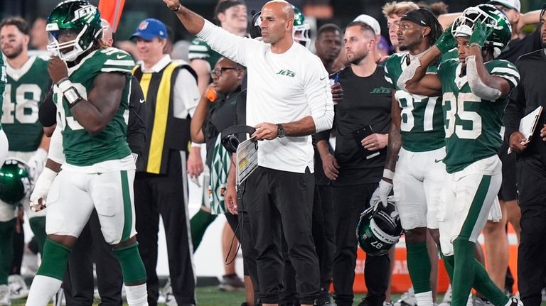 New York Jets head coach Robert Saleh reacts in the...