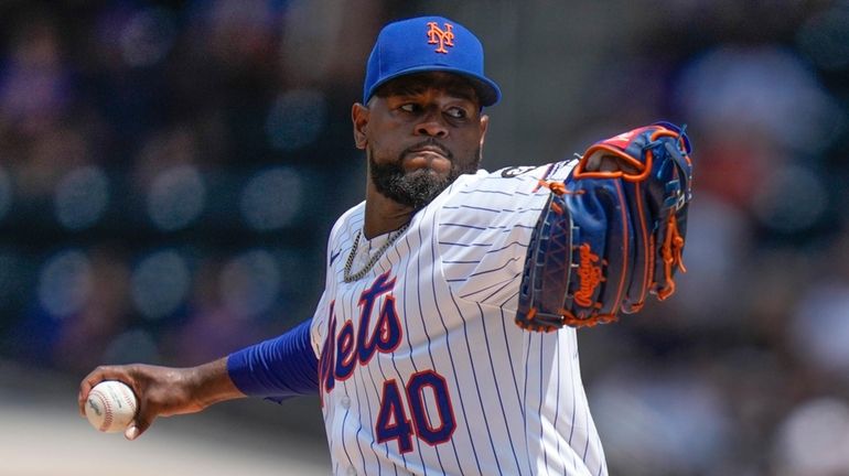 Mets pitcher Luis Severino throws during the first inning of...