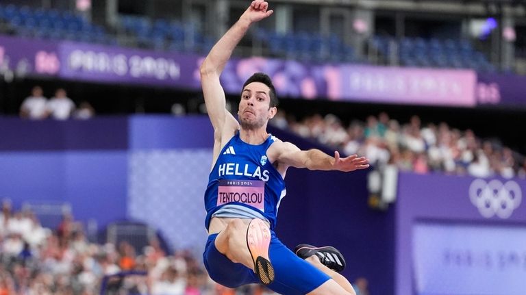 Miltiadis Tentoglou, of Greece, competes during the men's long jump...