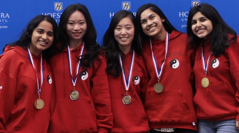 Herricks High School team members Pranjal Jain, left, Melissa Lau, Emily Cho,...