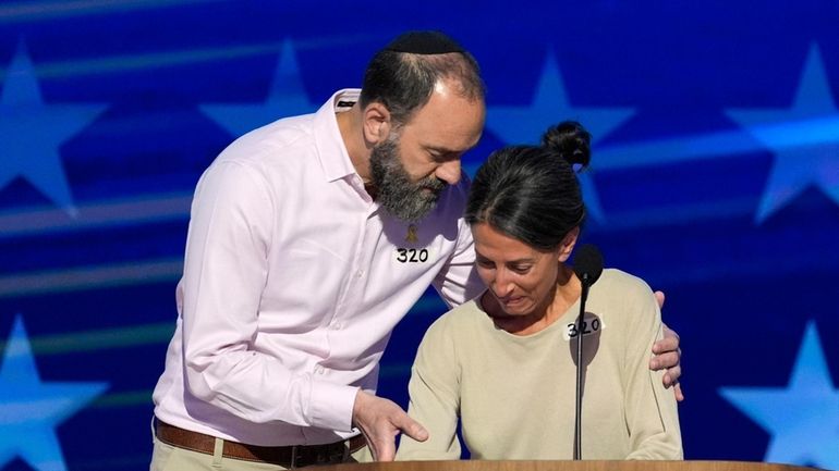 Jon Polin, left, and Rachel Goldberg, parents of Hersh Goldberg-Polin,...