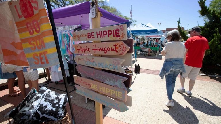 Signage and textiles at Kennedy Plaza in Long Beach.