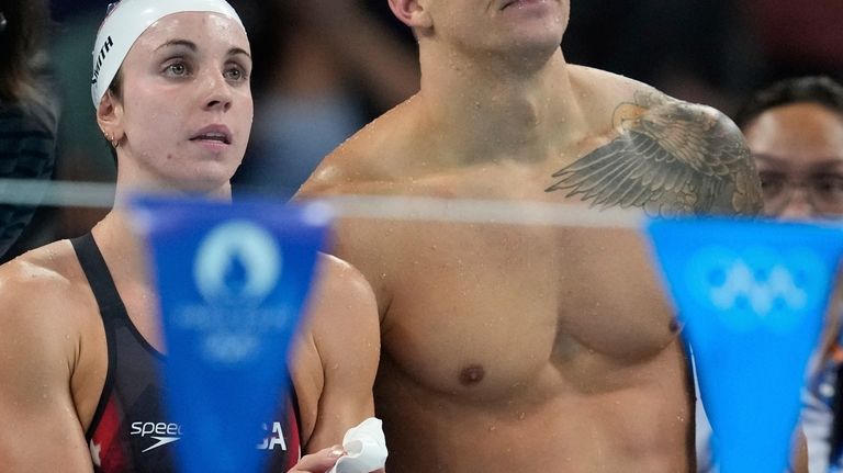 Regan Smith, left, and Caeleb Dressel of the United States...